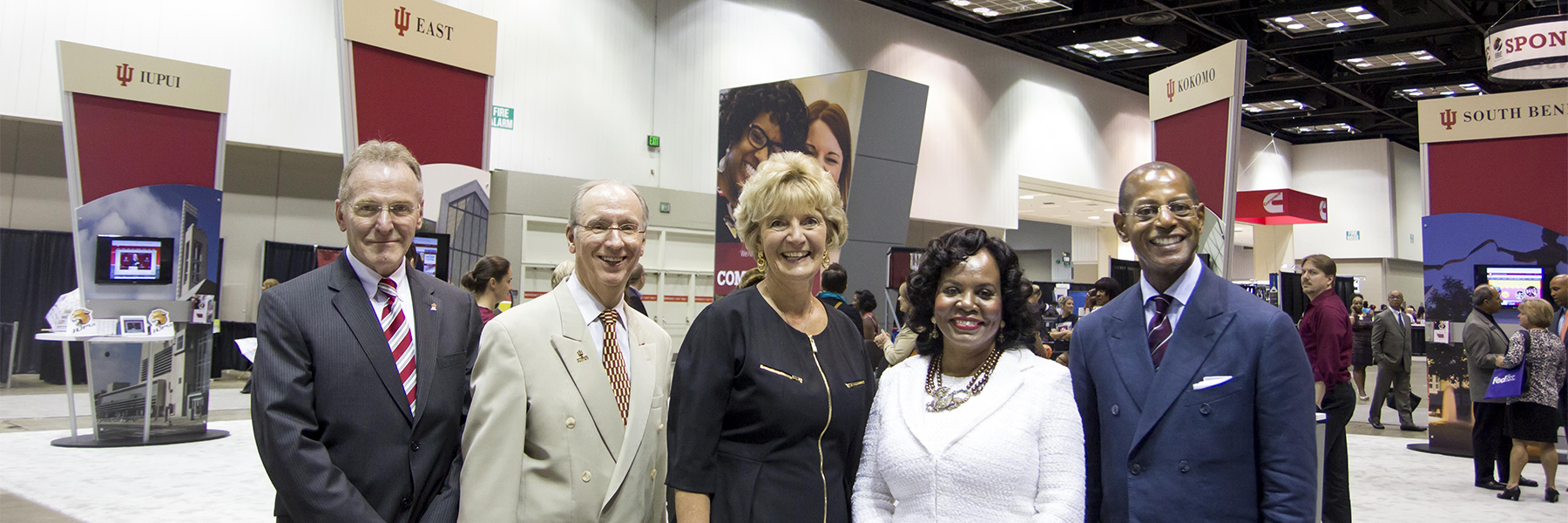 Speakers stand together at the Indiana Black Expo.